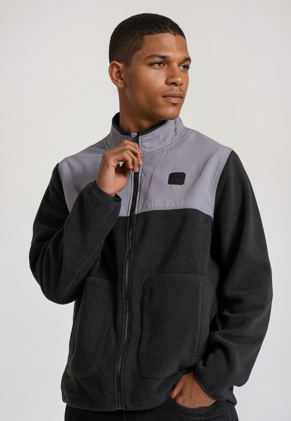 Oversized fleece zip-up cardigan with rubber logo