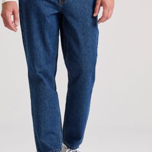 Loose fit jeans with destroyed effects