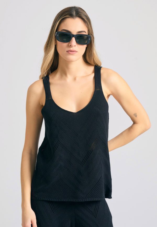 Women's knitted sleeveless blouse in jacquard weave