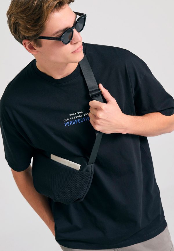 Oversized t-shirt with text artwork print on the back